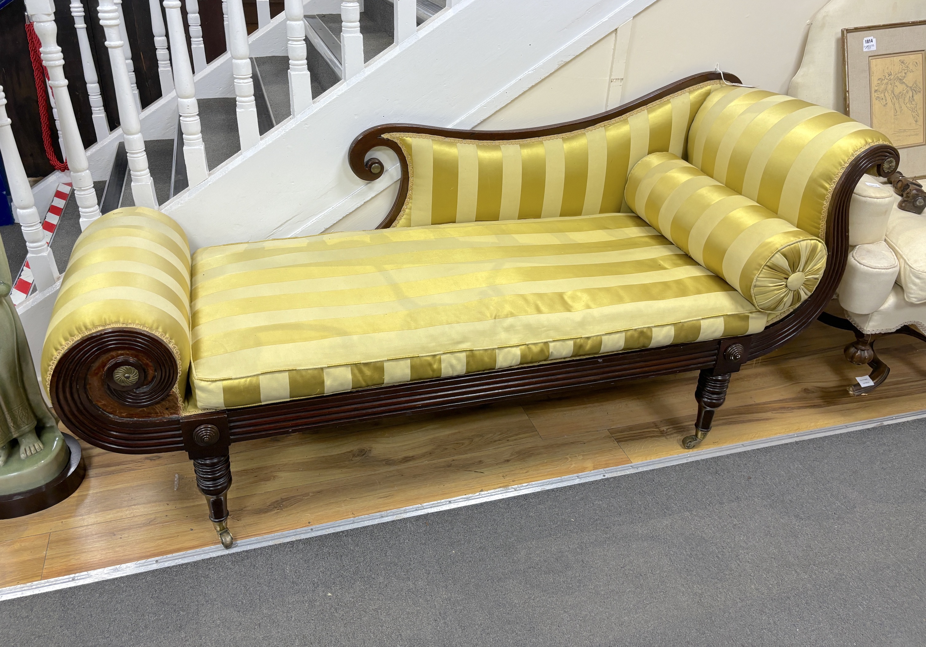 A Regency brass mounted mahogany chaise longue, width 180cm, depth 61cm, height 83cm